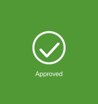 Green screen with a white tick in a circle to confirm approved